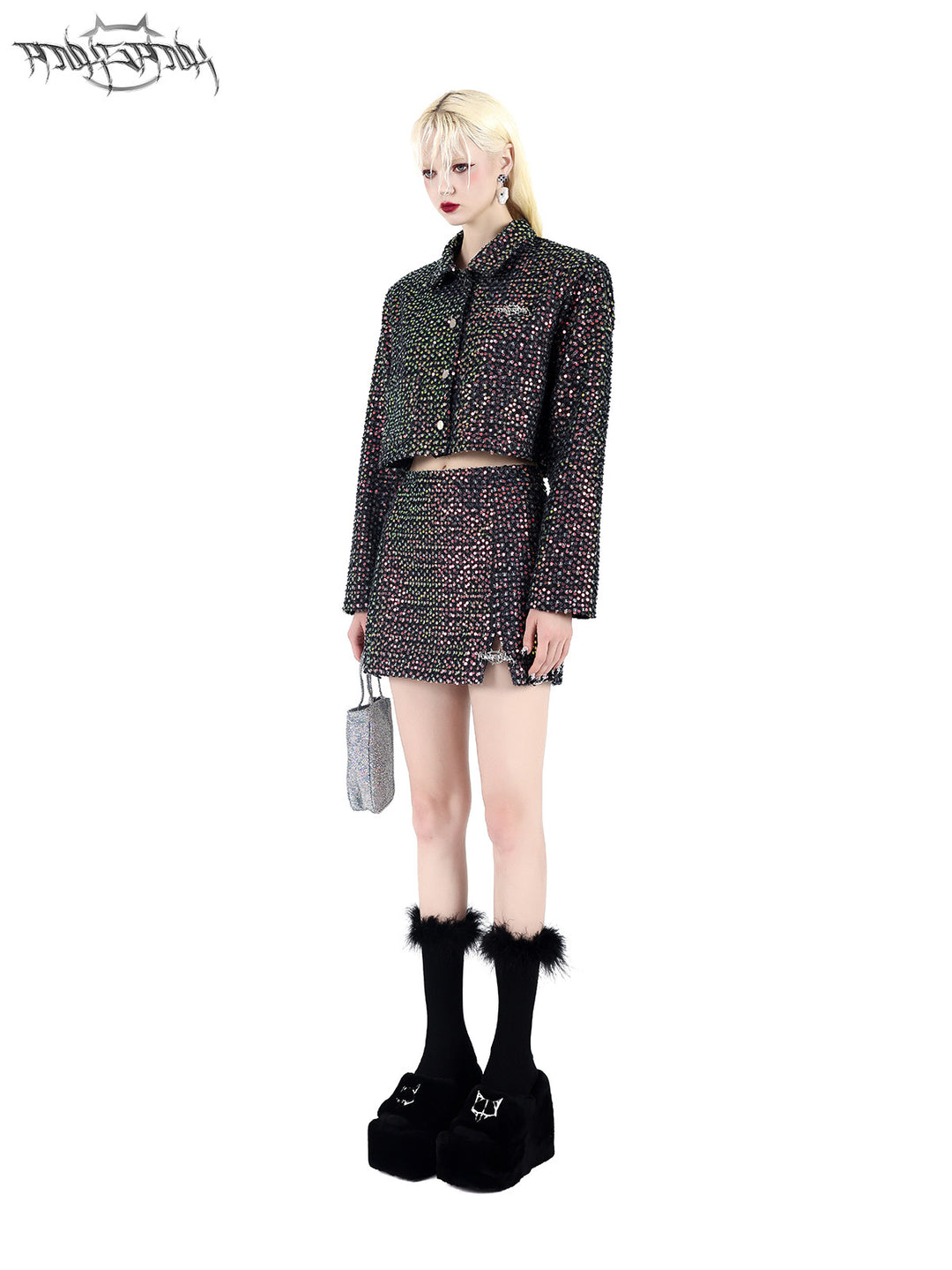 PINKSPINK SPARK sequined jacket and mini skirt set — black sequined set, angled full-length view