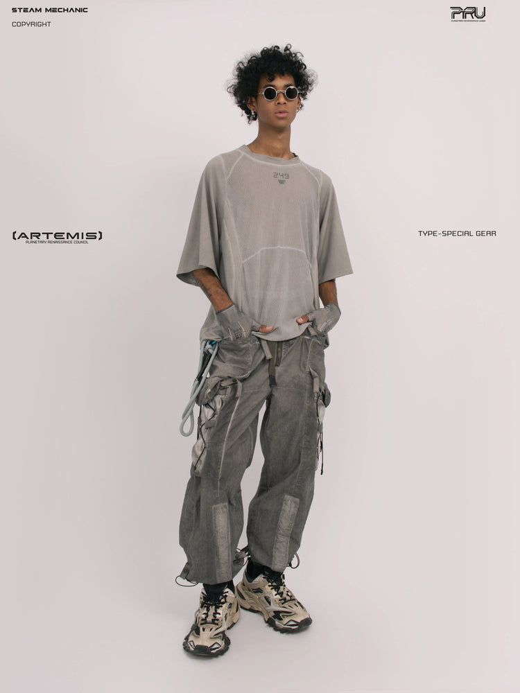 STARFIELD WELDER lunar sea gray distressed mesh tee — full-length three-quarter view holding the hem