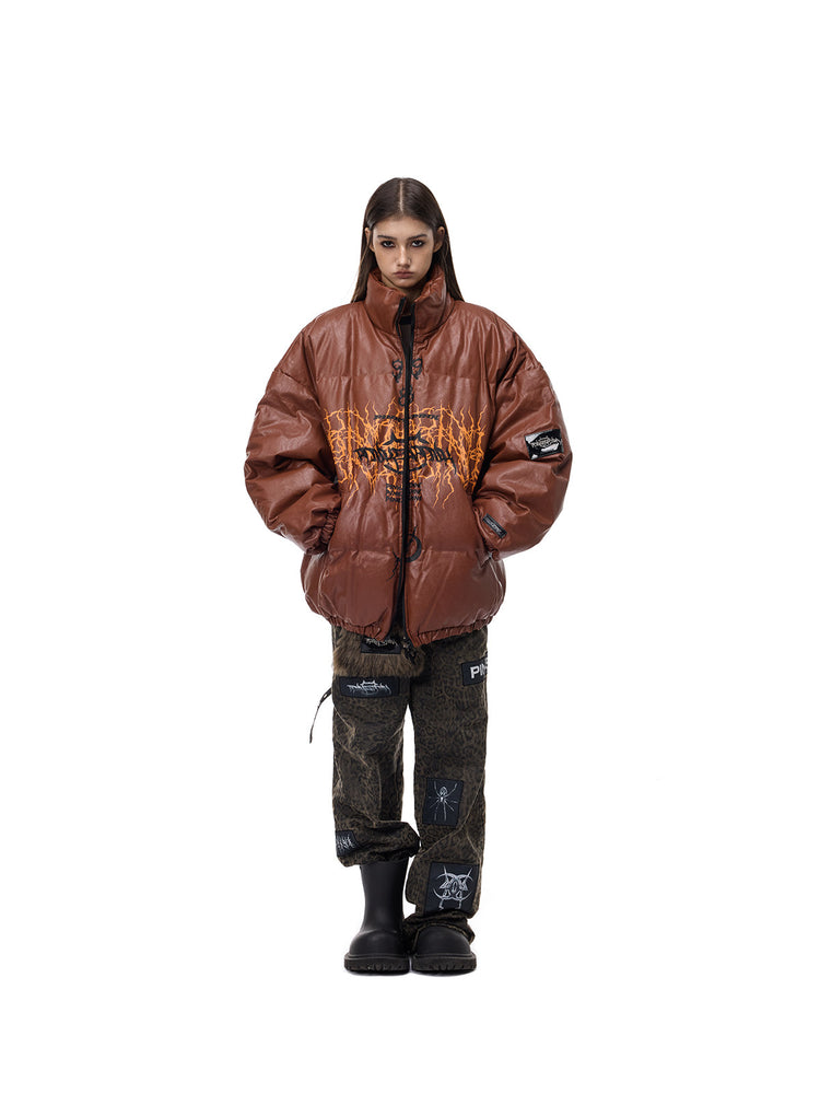 PINKSPINK MOTORBLOC padded faux-leather jacket — caramel brown front modeled view with hands in pockets