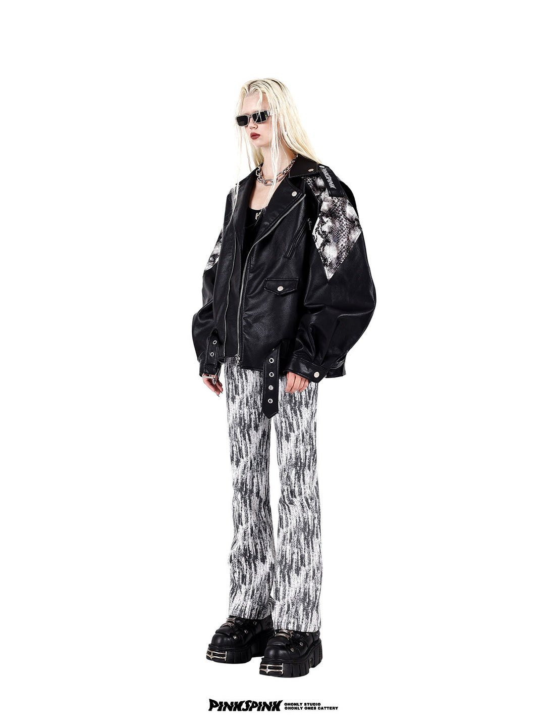 PINKSPINK COBRA snake-print faux-leather moto jacket — black full-length angled view styled with printed trousers