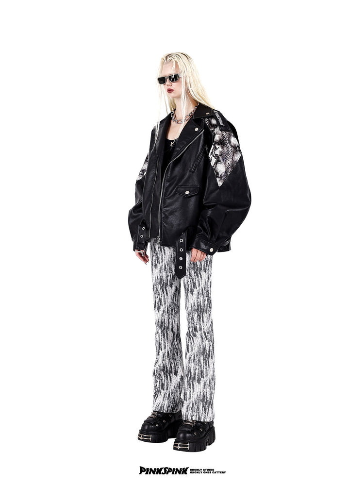 PINKSPINK COBRA snake-print faux-leather moto jacket — black full-length angled view styled with printed trousers