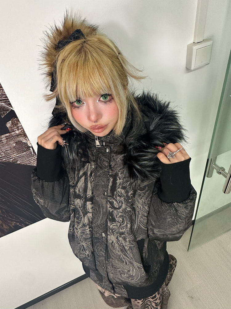 4RE1GN GOTHIC down jacket in charcoal ornamental print — Indoor front modeled view with hands holding the collar.