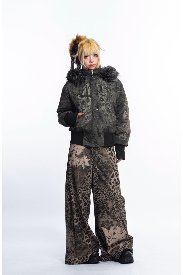 4RE1GN GOTHIC down jacket in charcoal ornamental print — Full-body front view with one hand in pocket.