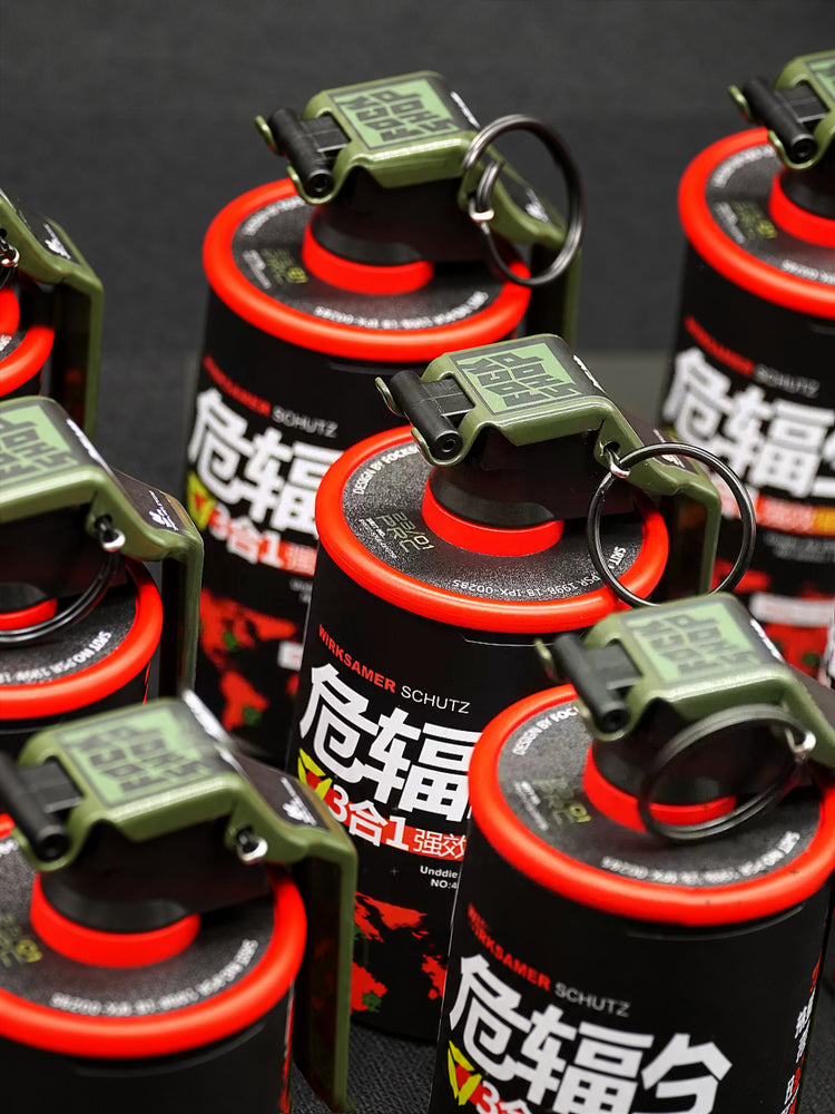 FOCKSHOP REBORN reactor canister prop — red canister cap and ring close-up with red and green canisters behind