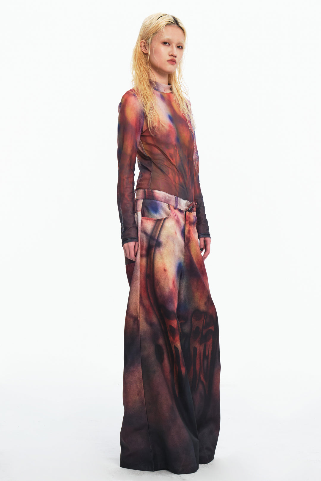 EMBRYO BRUISE SIGNAL printed wide-leg pants — close modeled view