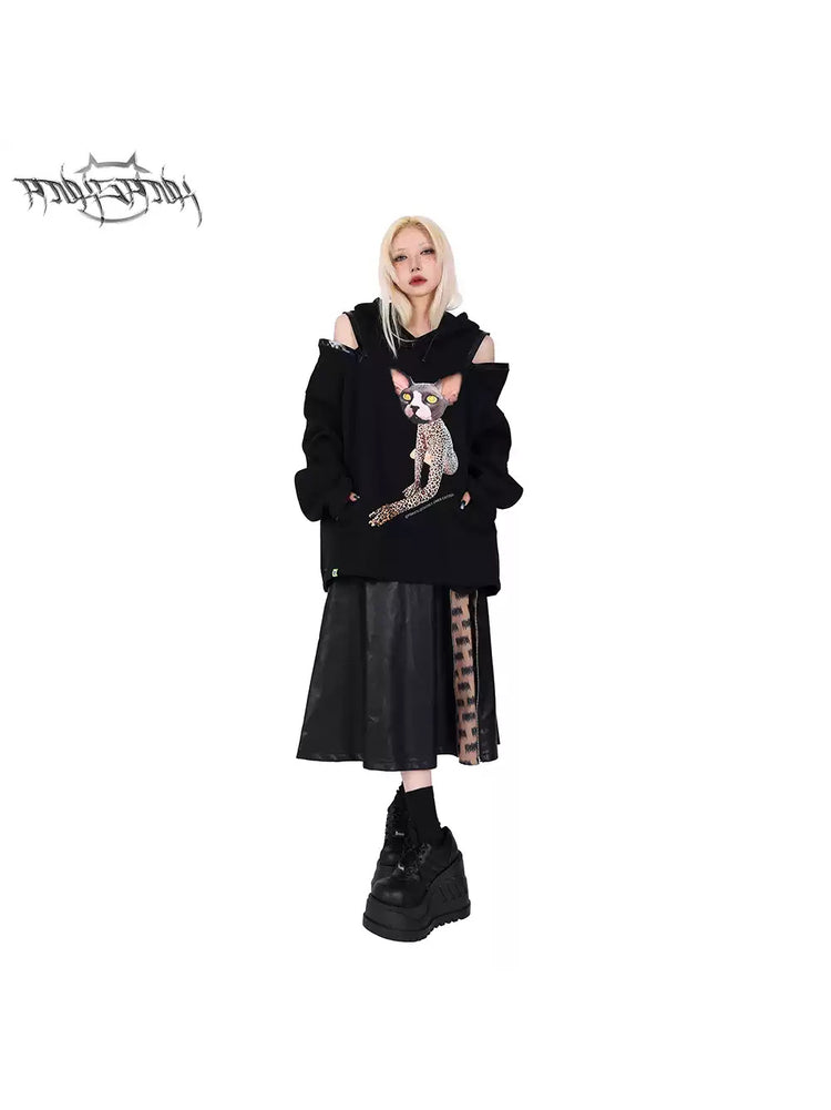 PINKSPINK EXHIBITION CORE zip A-line midi skirt — close modeled view highlighting the construction