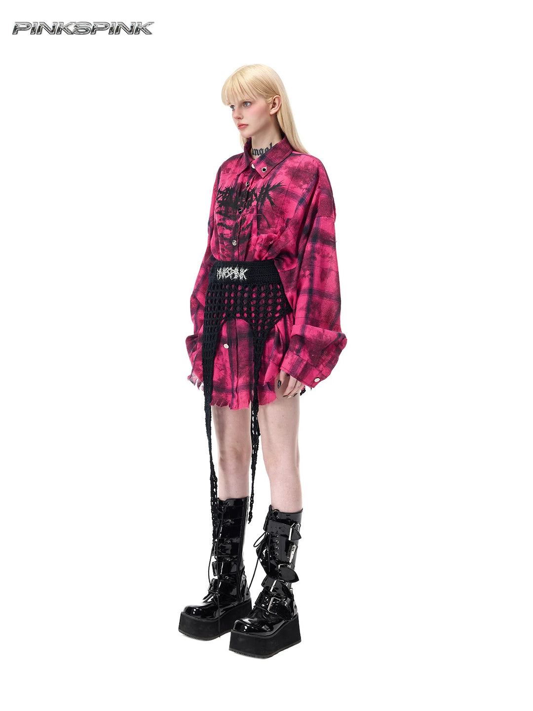 PINKSPINK ELECTRIC MOON distressed oversized plaid shirt in pink and black plaid — full-length angled modeled view styled with a black knit waist wrap