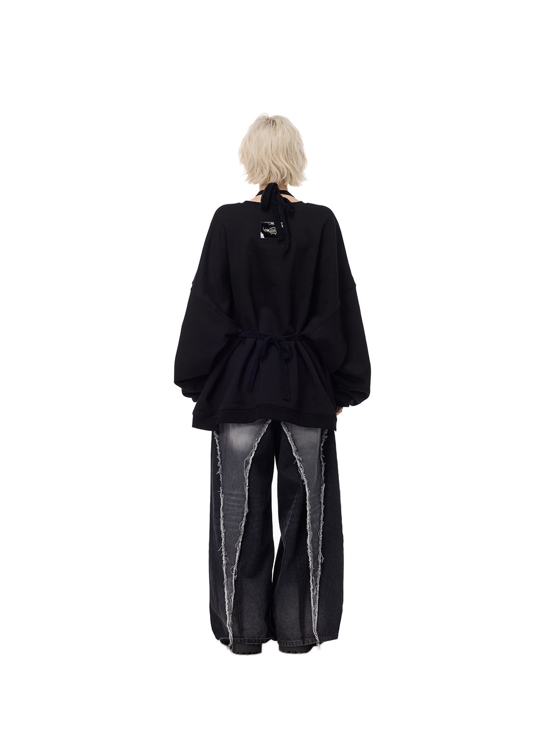 PINKSPINK ELECTRIC MOON patchwork knit layering apron — black back full-length styling over sweatshirt