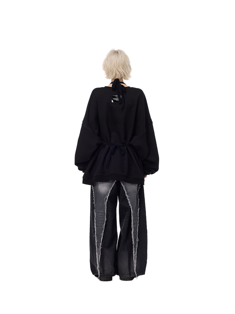 PINKSPINK ELECTRIC MOON patchwork knit layering apron — black back full-length styling over sweatshirt