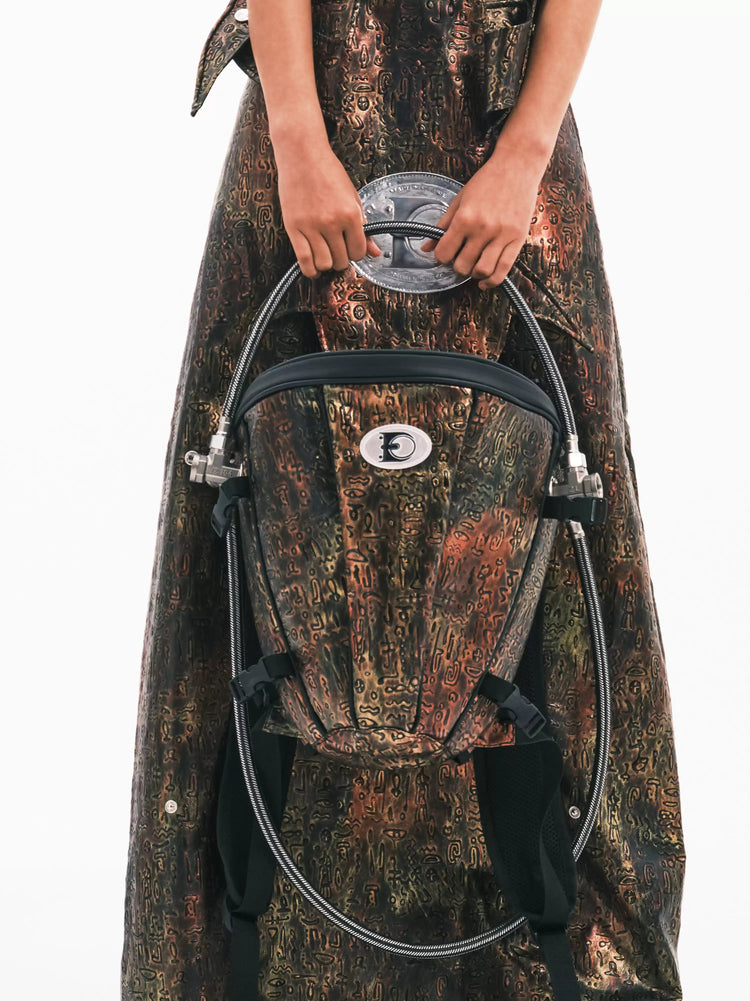 EMBRYO ORACLE embossed backpack — side or detail presentation