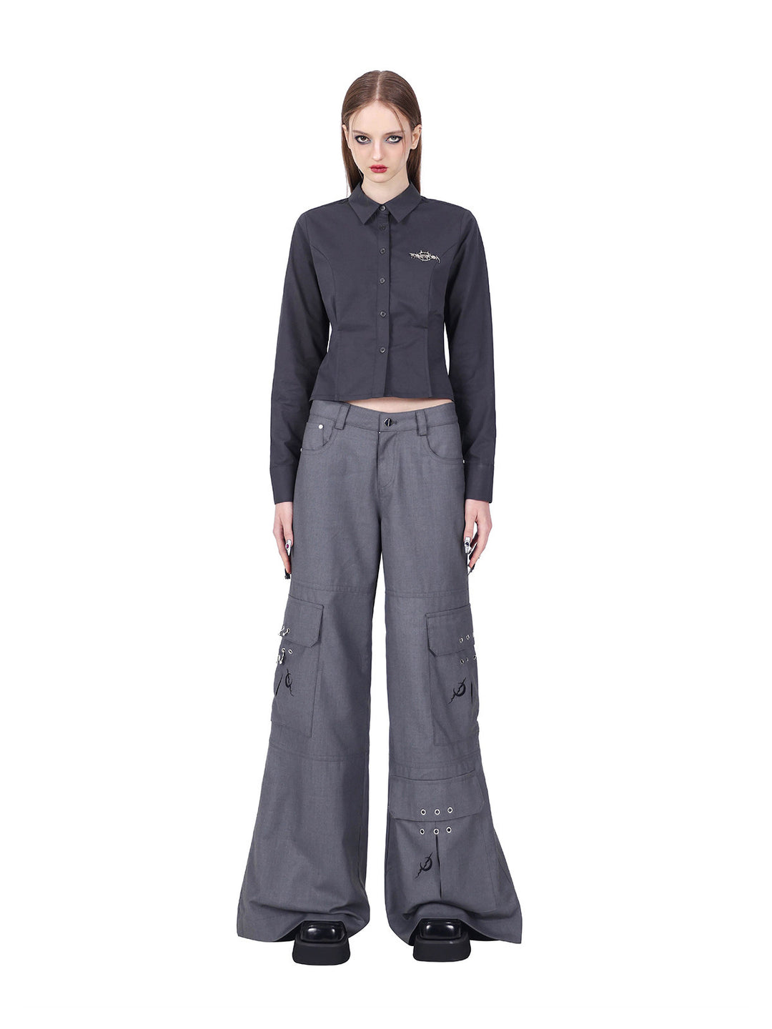 PINKSPINK ELECTRIC MOON sculpted cropped cotton shirt in gray — straight-on front modeled view with gray trousers