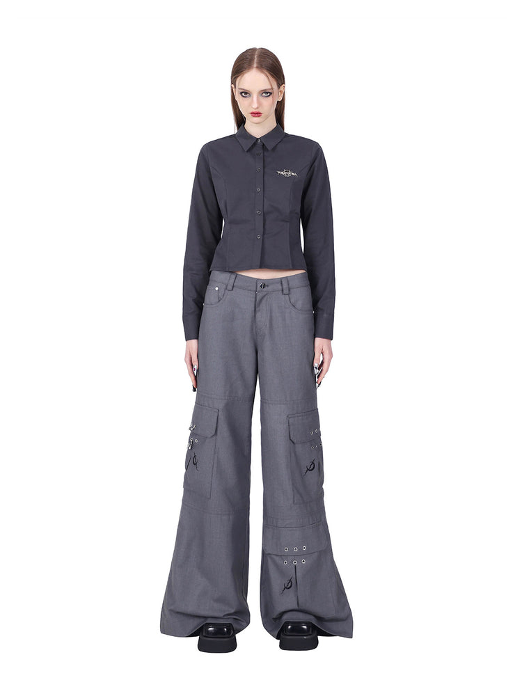 PINKSPINK ELECTRIC MOON sculpted cropped cotton shirt in gray — straight-on front modeled view with gray trousers