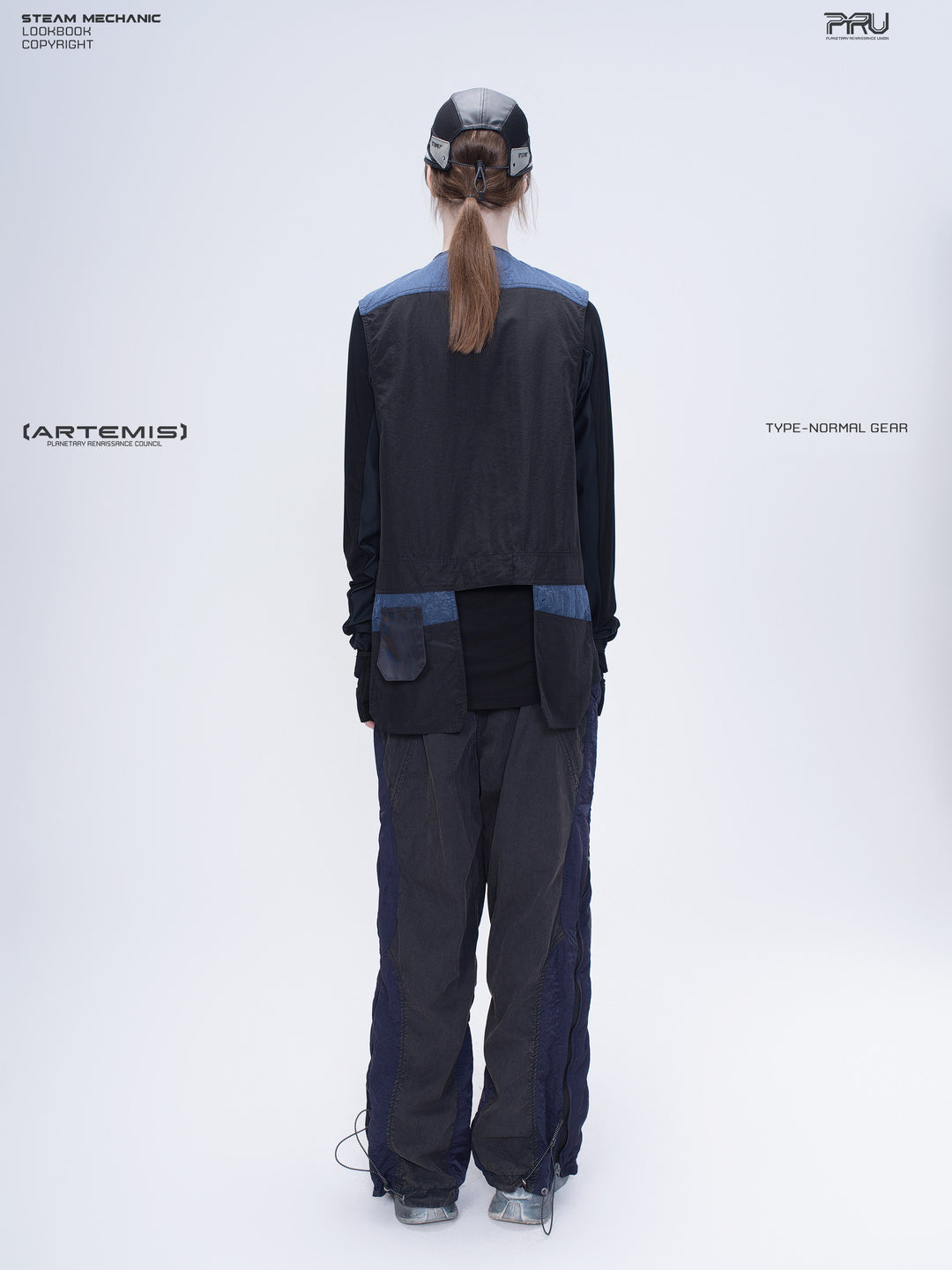 SUPERNOVA zima blue metallic nylon technical pants — full-length modeled back view showing the contrasting lower legs
