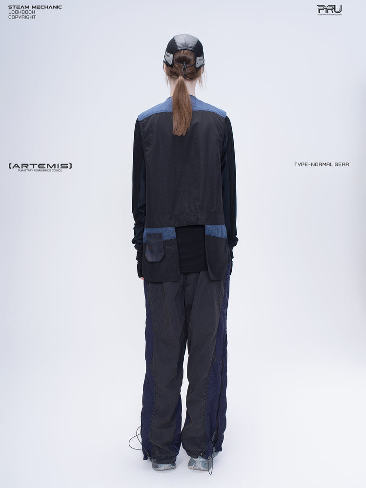 SUPERNOVA zima blue metallic nylon technical pants — full-length modeled back view showing the contrasting lower legs