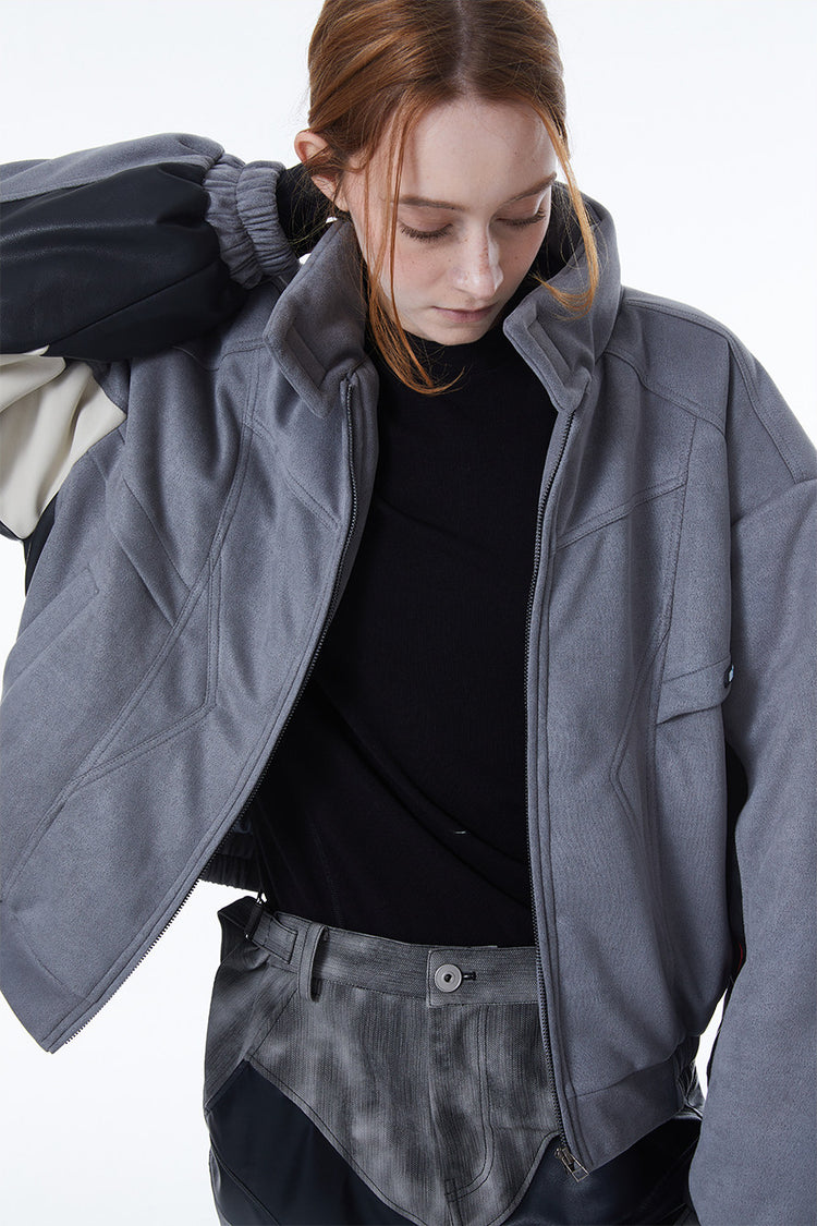 ERRORCODE ROBOT haze-blue contrast-panel padded racing jacket, open-front close-up showing suede-effect texture and panel seams