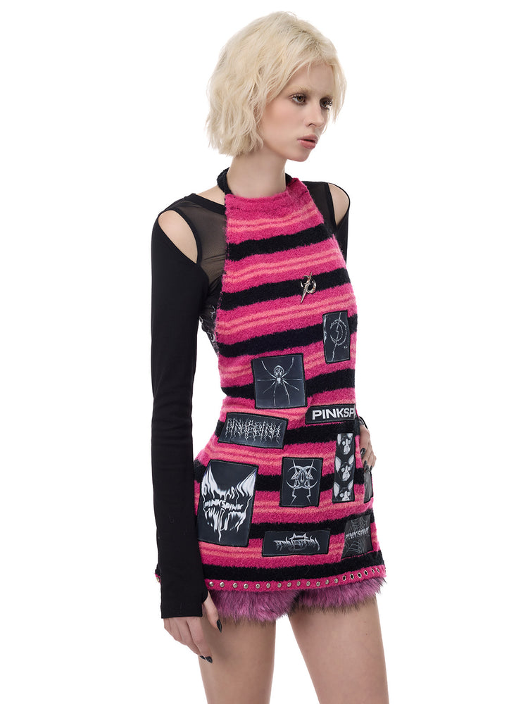 PINKSPINK ELECTRIC MOON patchwork knit layering apron — pink black stripe three-quarter modeled view