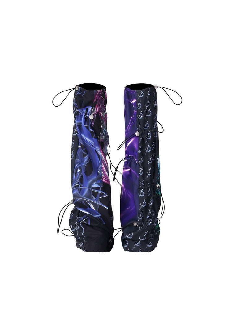 PINKSPINK COSMOS drawcord patchwork leg warmers in black purple multicolor — garment-only view of the pair showing the adjustable drawcords