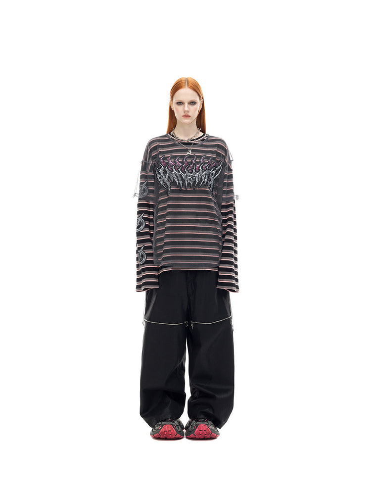 PINKSPINK ELECTRIC MOON striped mesh-overlay two-piece tee in black pink — front modeled close-up with a cat-ear hat