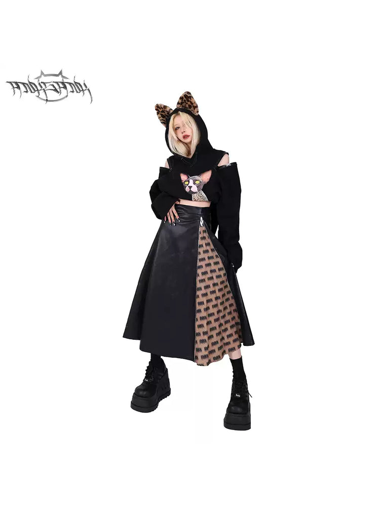 PINKSPINK EXHIBITION CORE zip A-line midi skirt — modeled front styling view