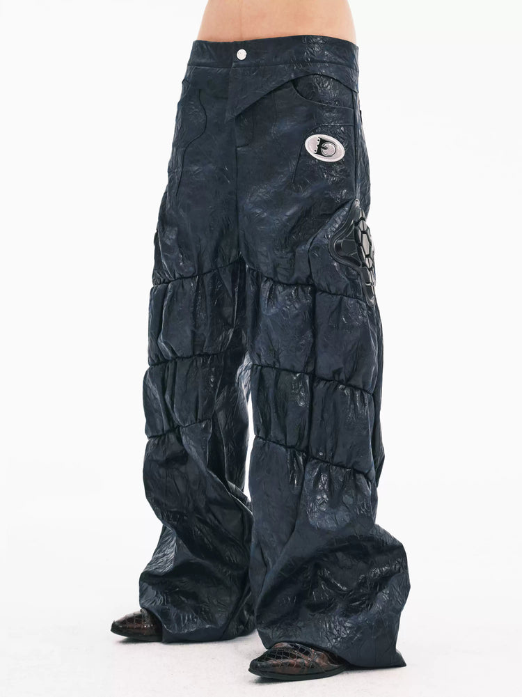 EMBRYO GUARD SHELL ruched PU leather flare pants — side modeled view
