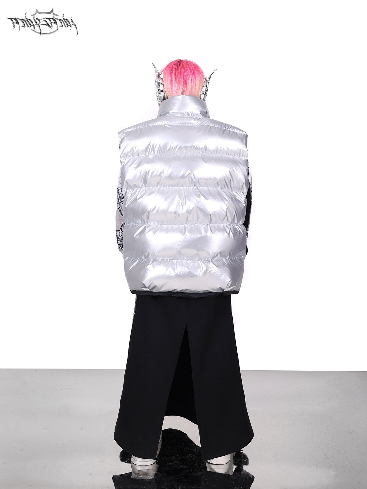 PINKSPINK ORBIT reversible padded vest in black silver — silver-side rear full-length modeled view showing the quilting