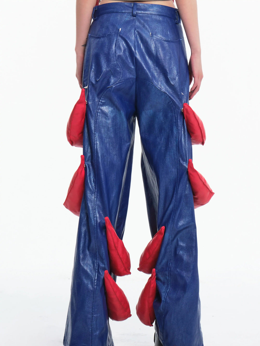EMBRYO RED CLAW convertible padded PU pants — side or detail presentation