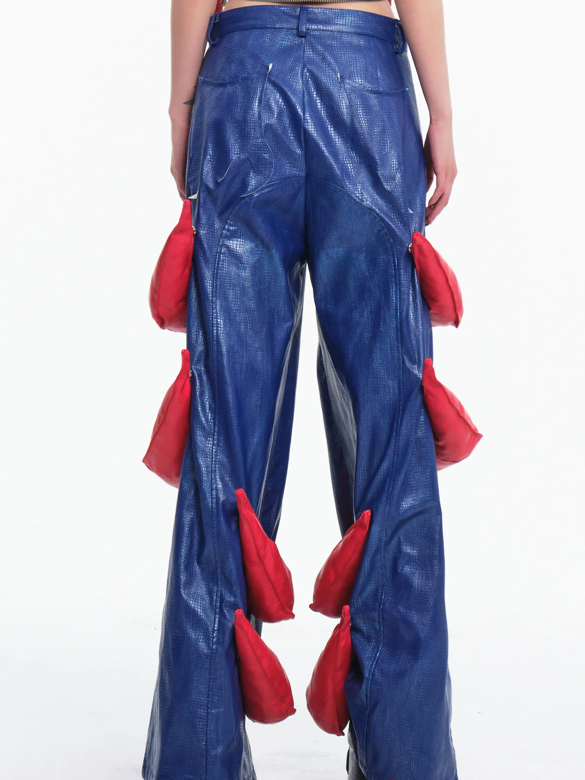 EMBRYO RED CLAW convertible padded PU pants — side or detail presentation