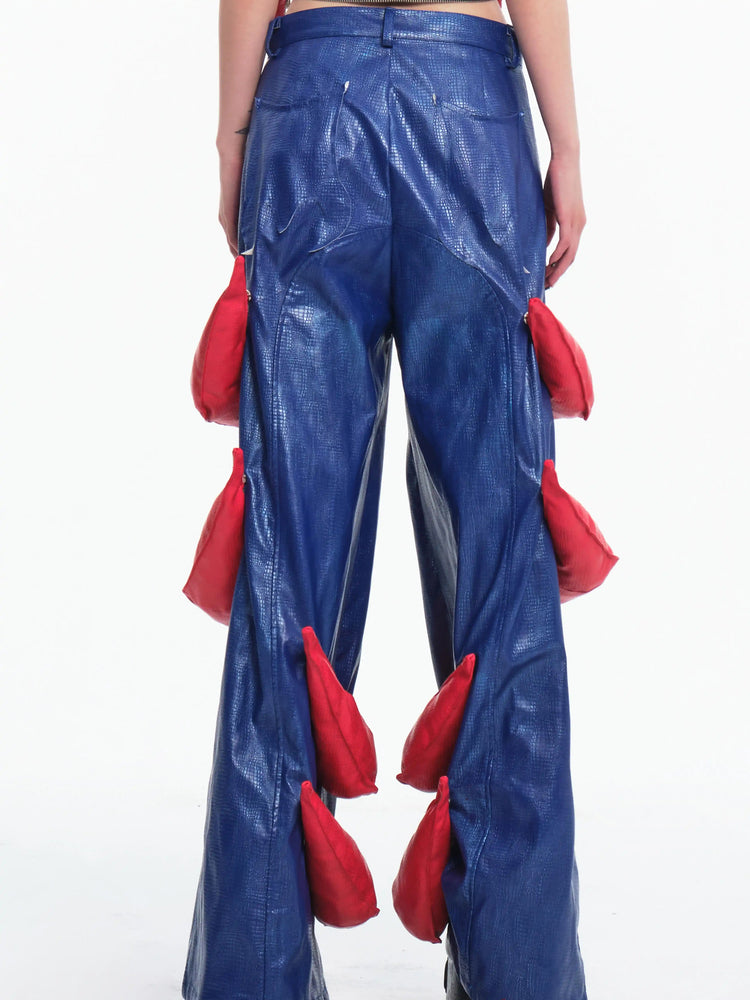EMBRYO RED CLAW convertible padded PU pants — side or detail presentation