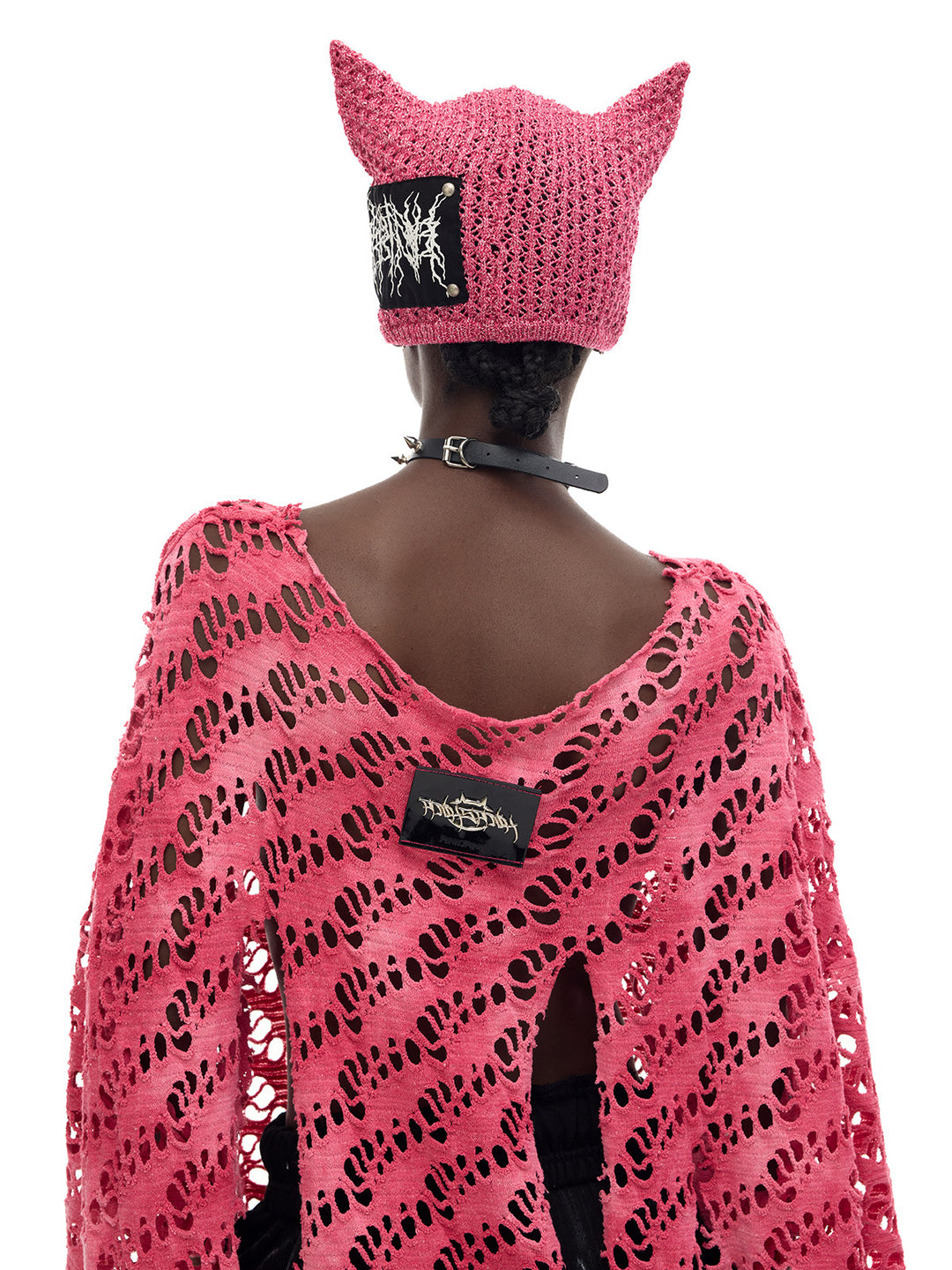PINKSPINK ELECTRIC MOON distressed open-knit oversized tee in pink — close back view showing the wide neckline and distressed knit