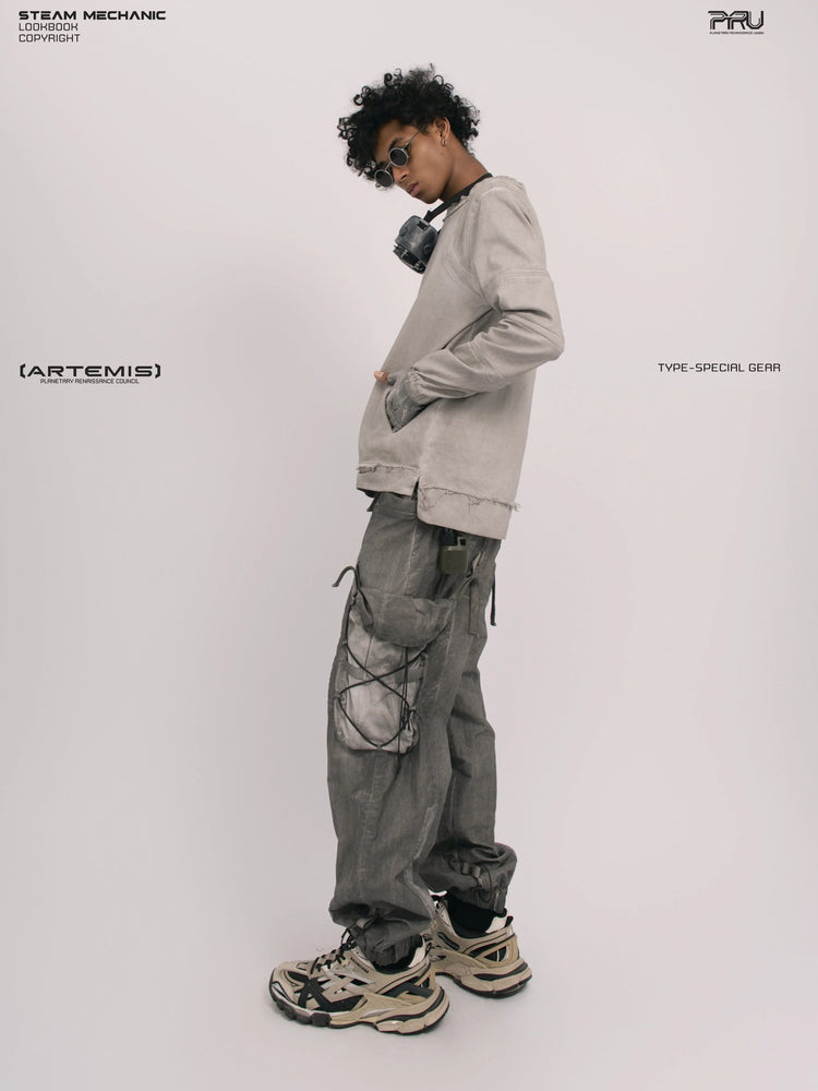CHAOS ERA eris white raw-edge long-sleeve top — full-length opposite-side view with hands in pockets