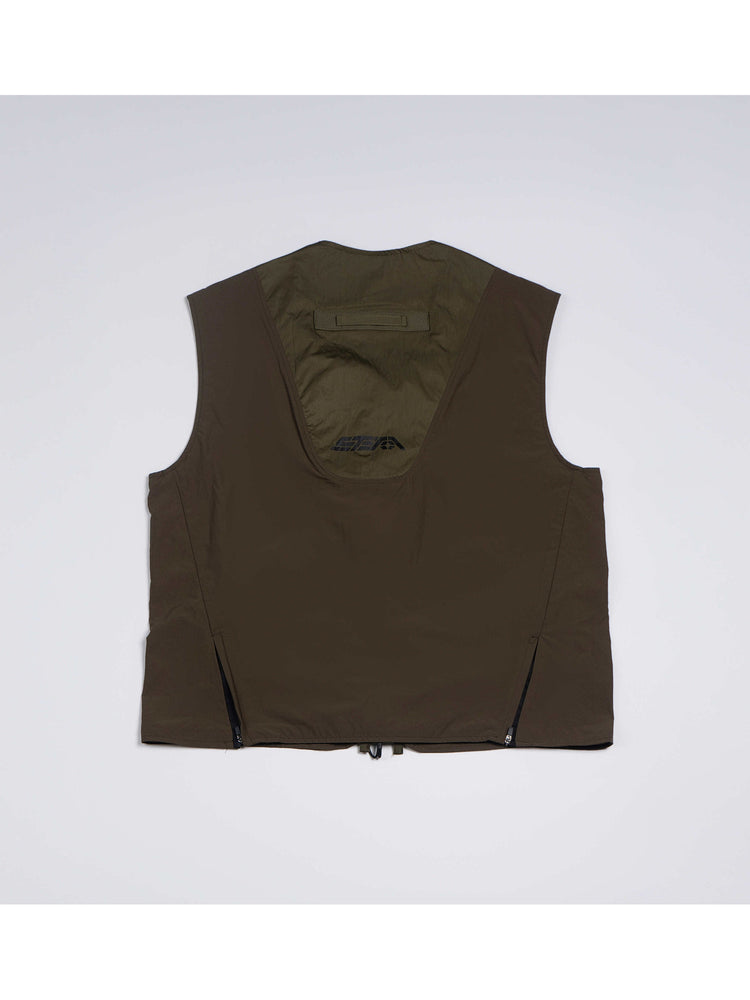 CLERIC utility nylon vest in vine gray green — back flat-lay showing the curved panel, webbing loop and side zips