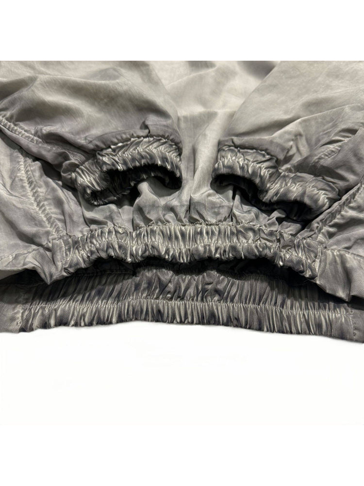 PIONEER meteorite-gray mesh hoodie — close-up of the gathered cuffs and elasticated hem