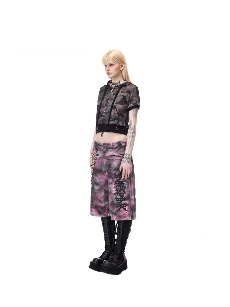 PINKSPINK ELECTRIC MOON coated camouflage denim shorts in pink-gray camouflage — full side view showing the below-knee length
