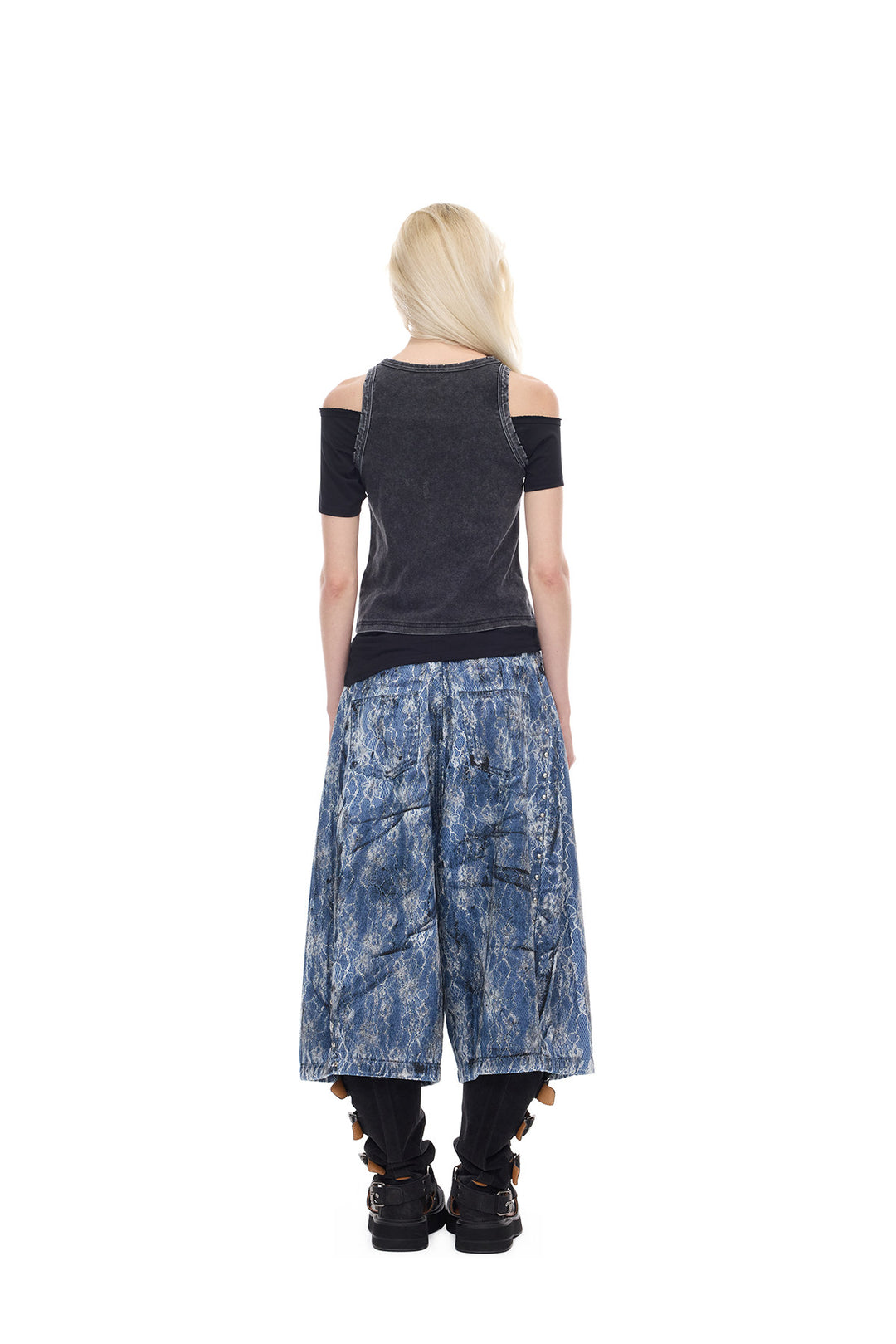 PINKSPINK ELECTRIC MOON lace-coated wide-leg denim shorts in blue — full-length back modeled view styled with a black tank top