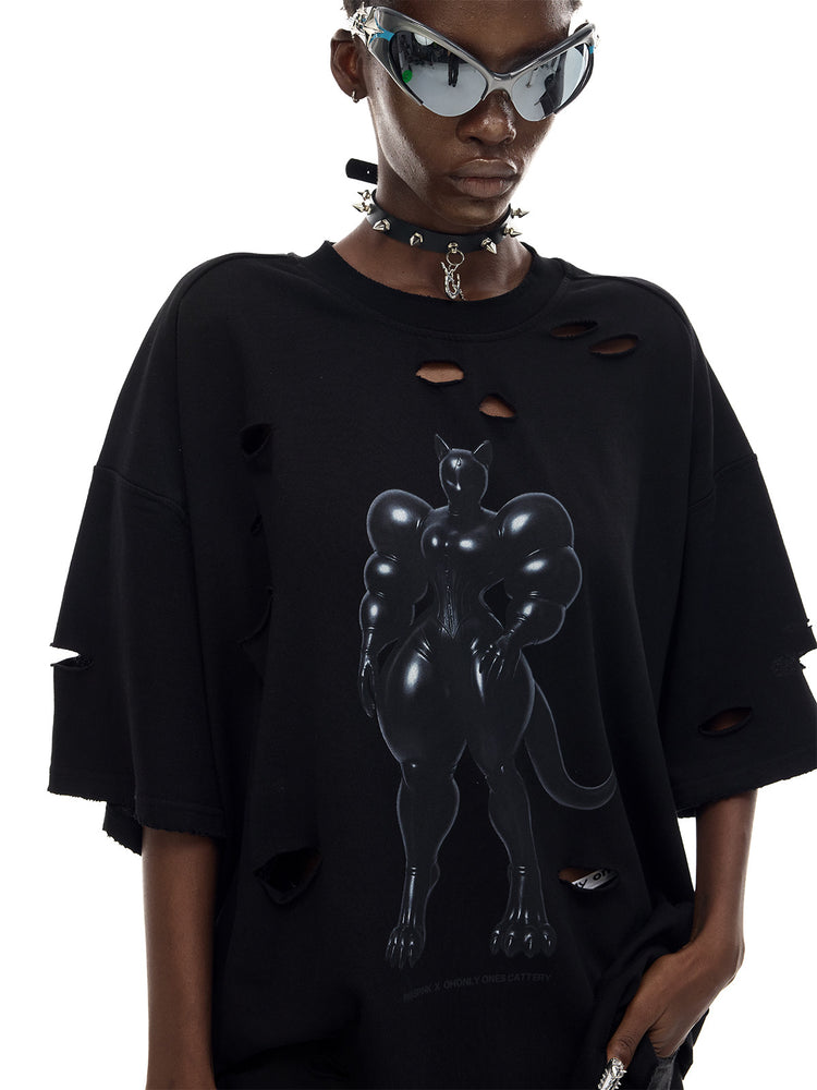 PINKSPINK FUTURE CAT distressed oversized tee in black — front modeled close-up showing the cat graphic and distressed neckline