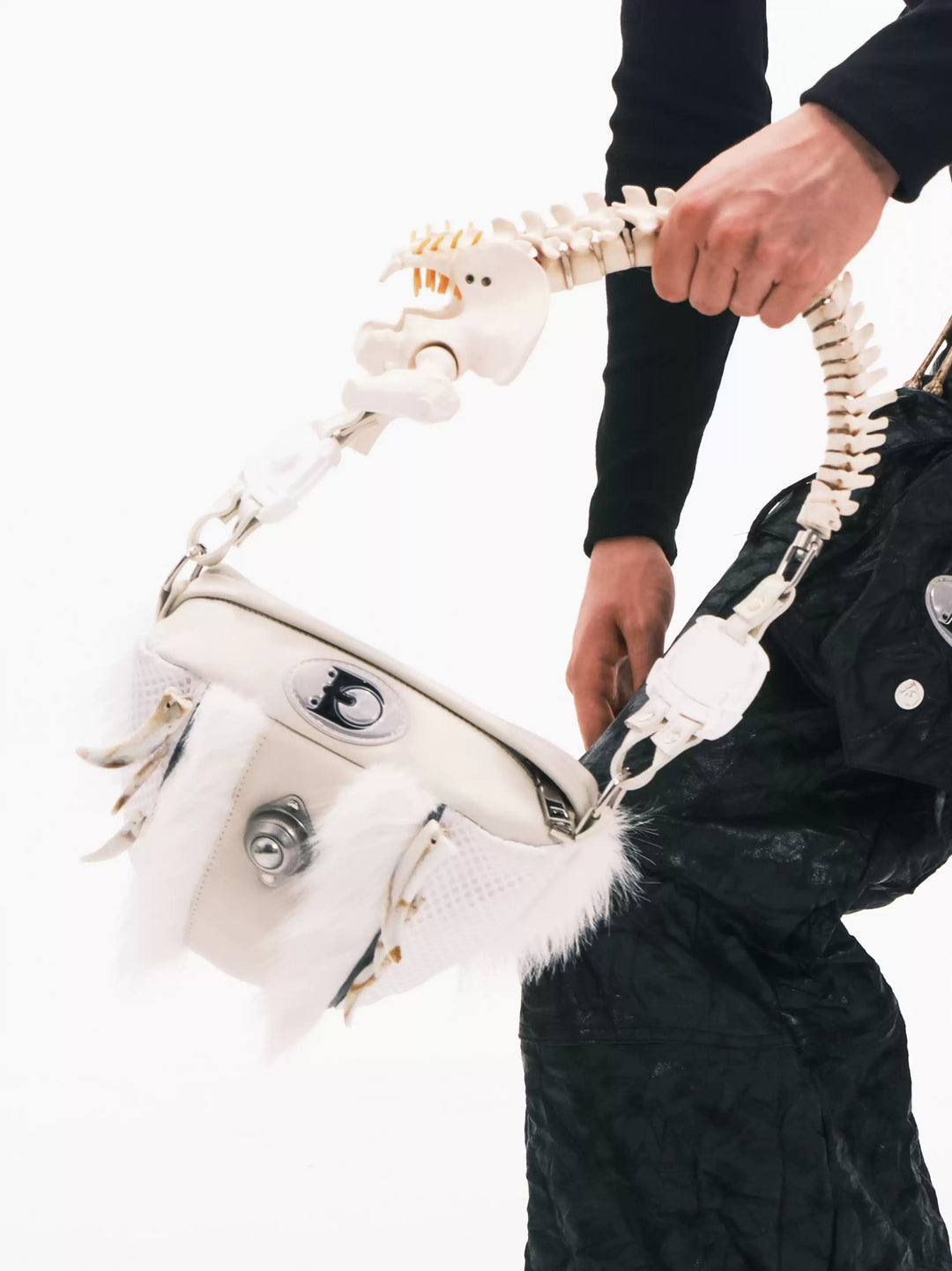 EMBRYO SPINE FRAME bone-handle leather bag — side or detail presentation