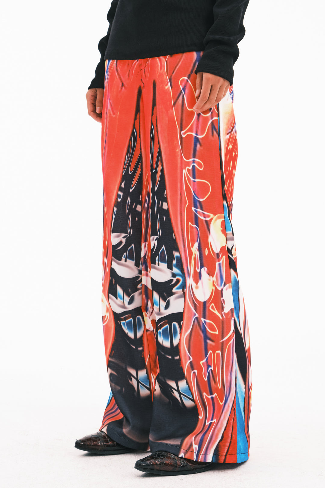EMBRYO NEURAL FIRE printed flare pants — close modeled view