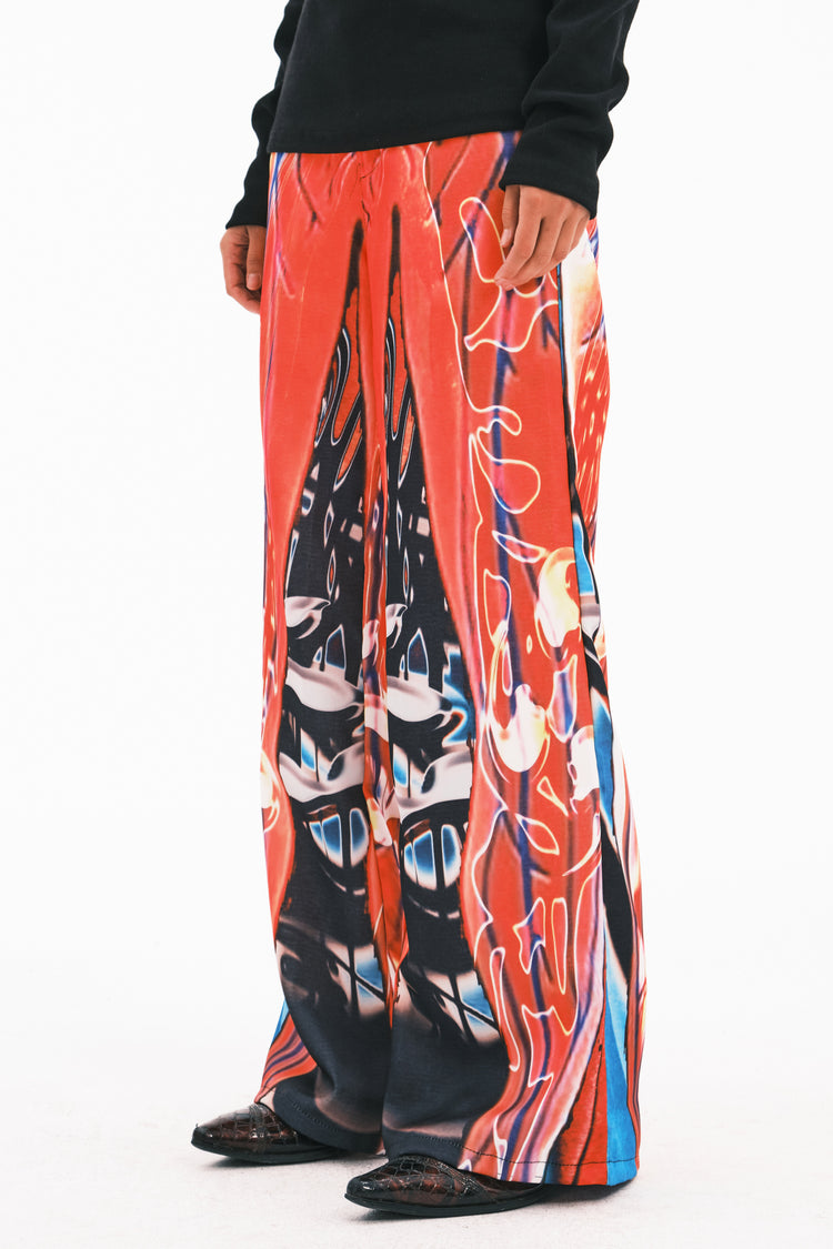 EMBRYO NEURAL FIRE printed flare pants — close modeled view