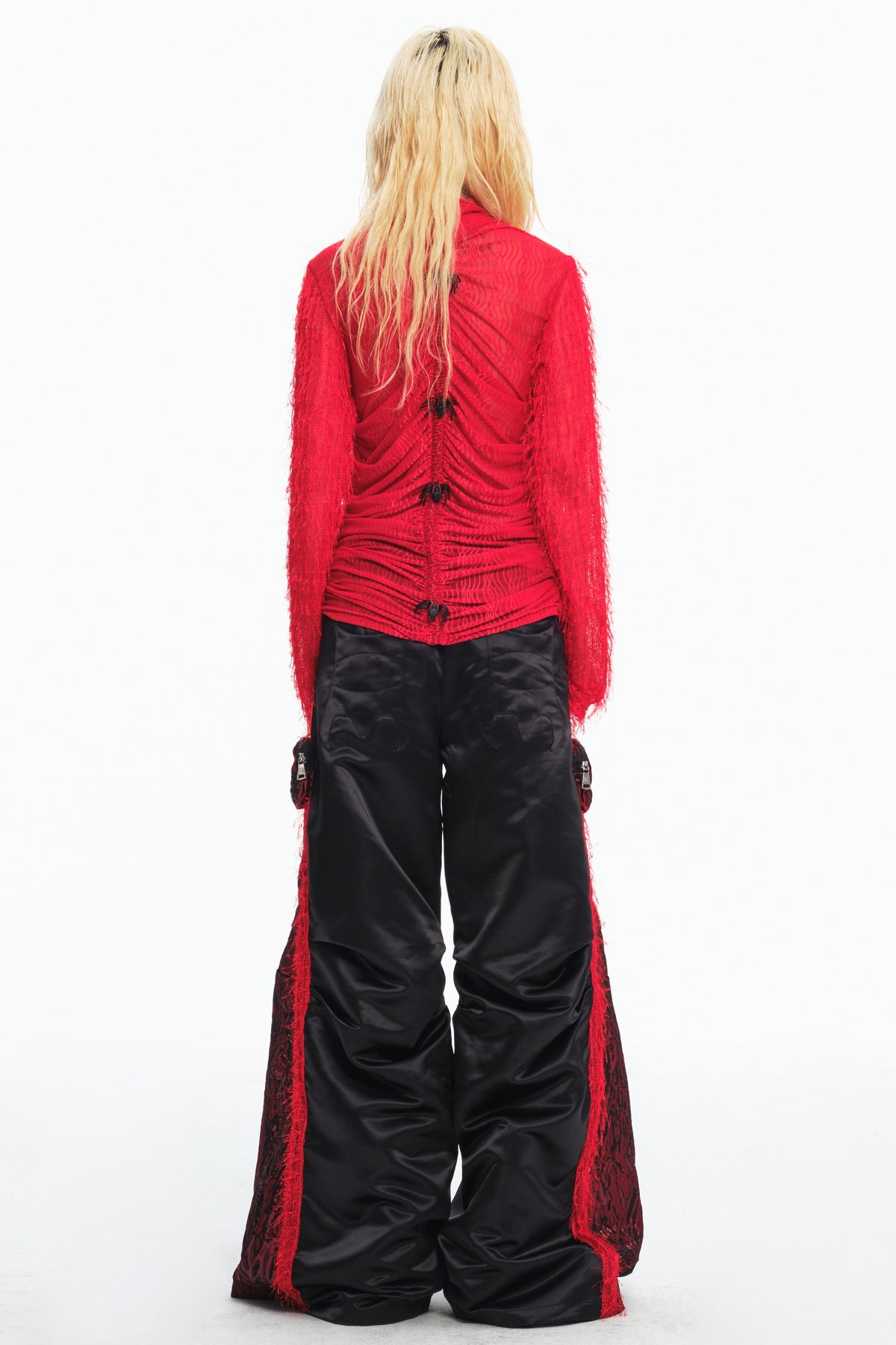 EMBRYO RED SPIDER distressed mesh top in red — back modeled view showing the row of black spider details