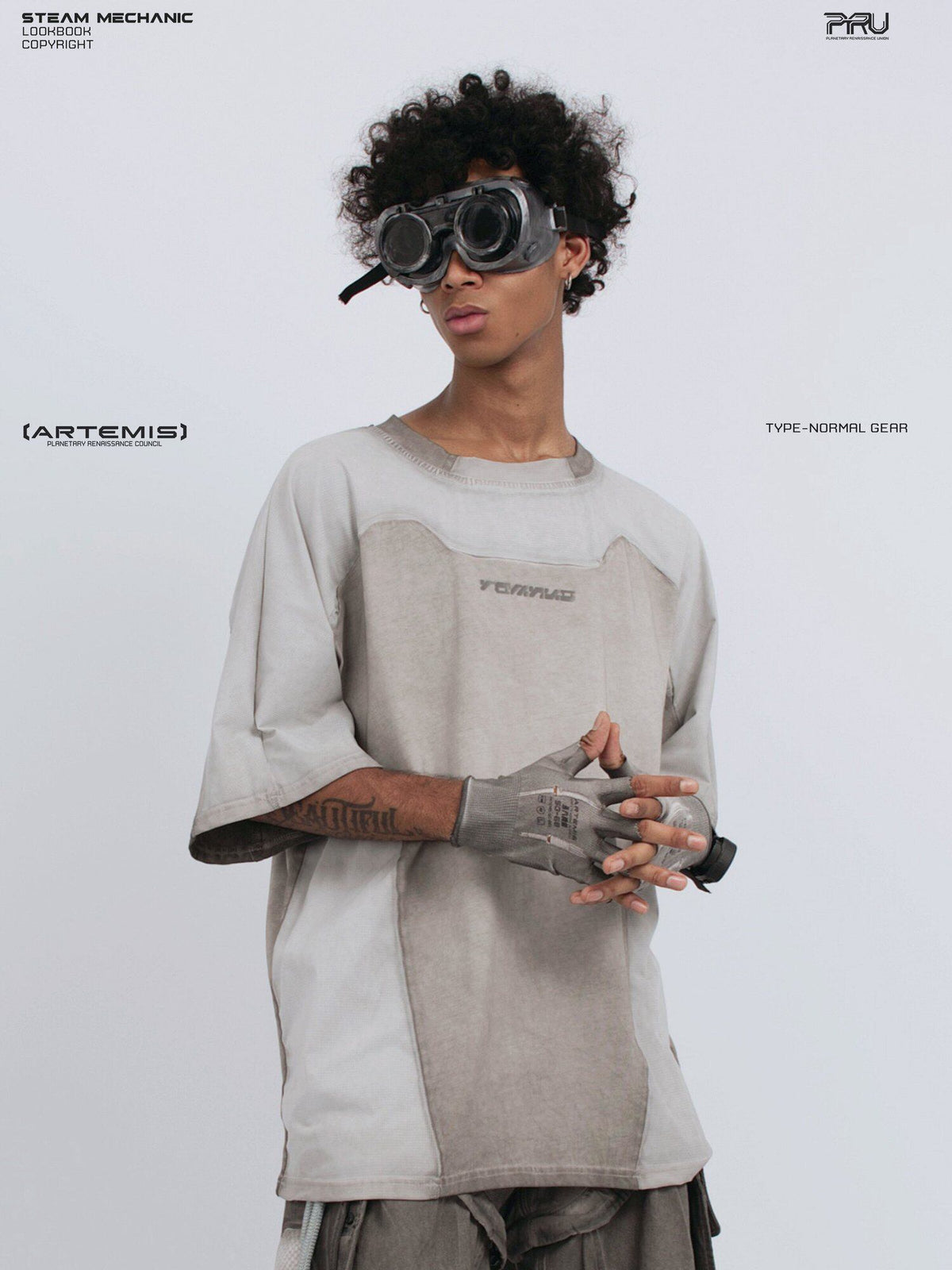 STARCORE moonbeam white velcro mesh tee — angled front close-up showing the curved chest panel and raised clasped hands