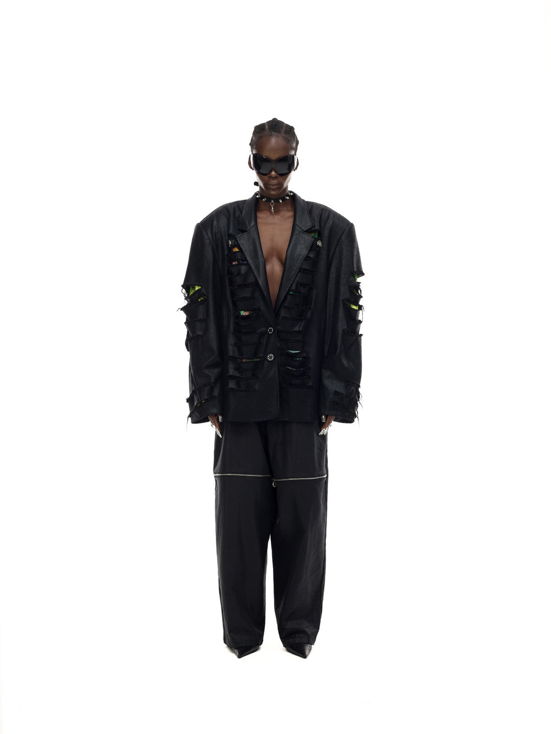 PINKSPINK ELECTRIC MOON coated zip-knee wide-leg pants in black — front full-length modeled view corresponding to the hero