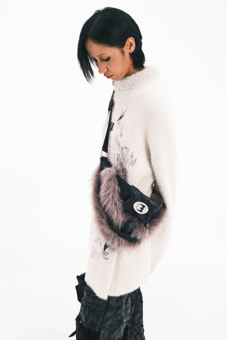 EMBRYO HORNFORM faux-fur hat & bag — full-length modeled view