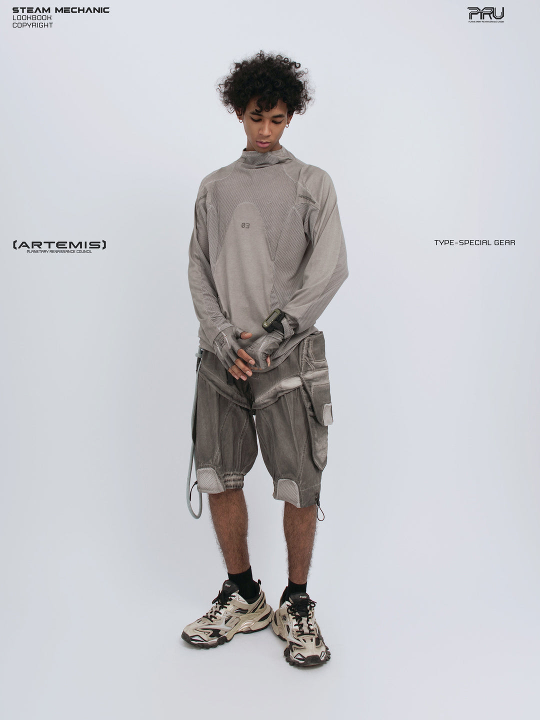 STARCORE mesh-panel long-sleeve top in dusk cloud gray — full-length front modeled view with hands crossed