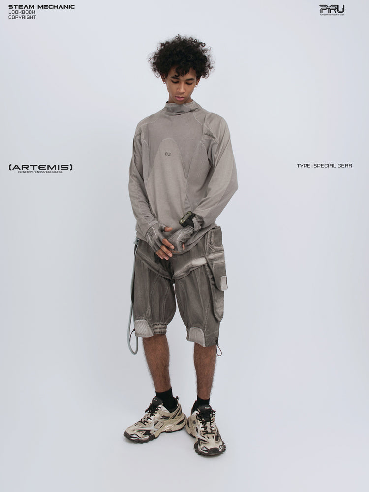 STARCORE mesh-panel long-sleeve top in dusk cloud gray — full-length front modeled view with hands crossed
