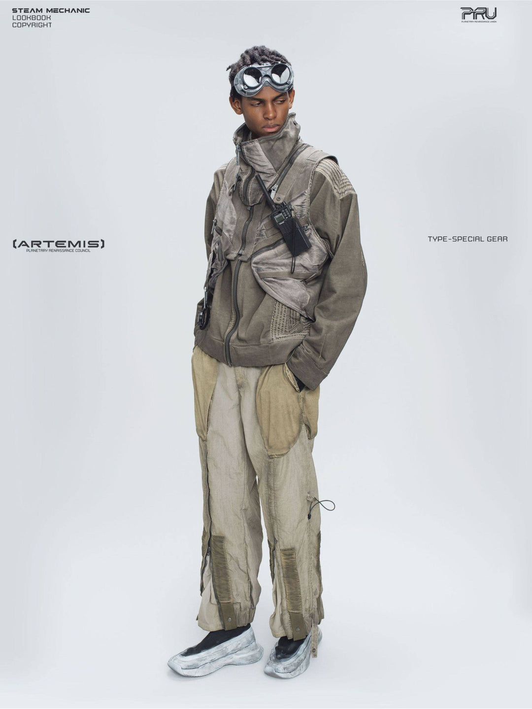 FISSION modular vest in mercury brown — full-length modeled three-quarter view