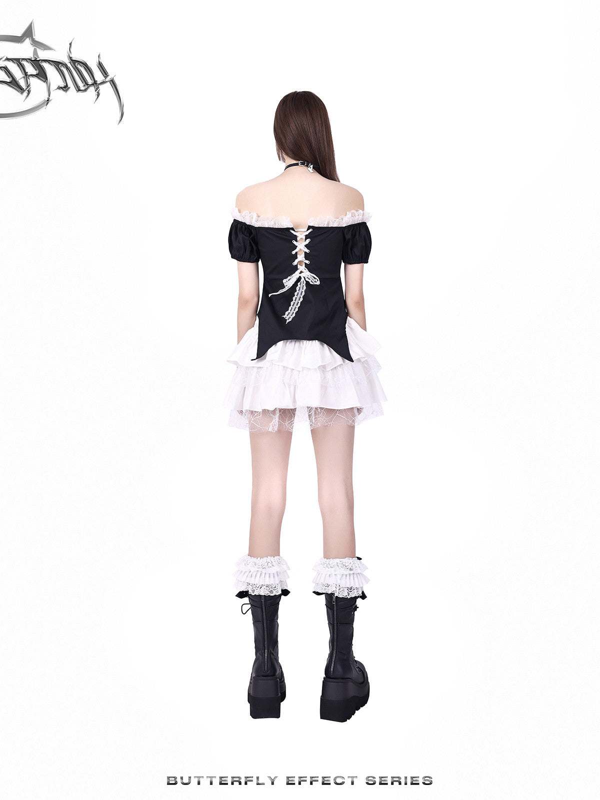 PINKSPINK BUTTERFLY EFFECT off-shoulder two-piece mini dress in black white — rear full-length modeled view showing the lace-up fastening