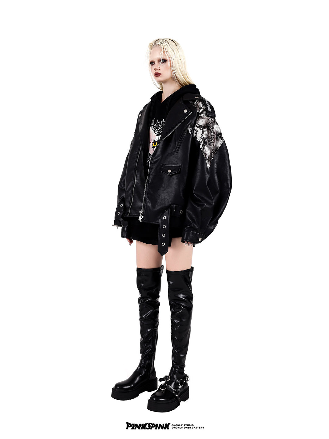 PINKSPINK COBRA snake-print faux-leather moto jacket — black side view styled over a graphic top