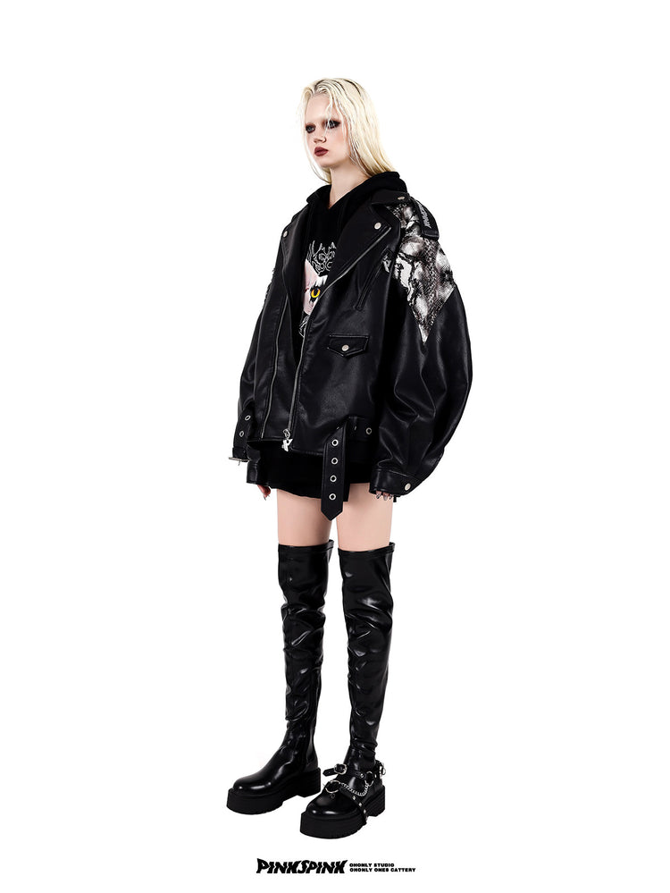 PINKSPINK COBRA snake-print faux-leather moto jacket — black side view styled over a graphic top