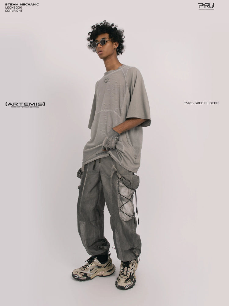 STARFIELD WELDER lunar sea gray distressed mesh tee — full-length three-quarter view with one hand in a pocket