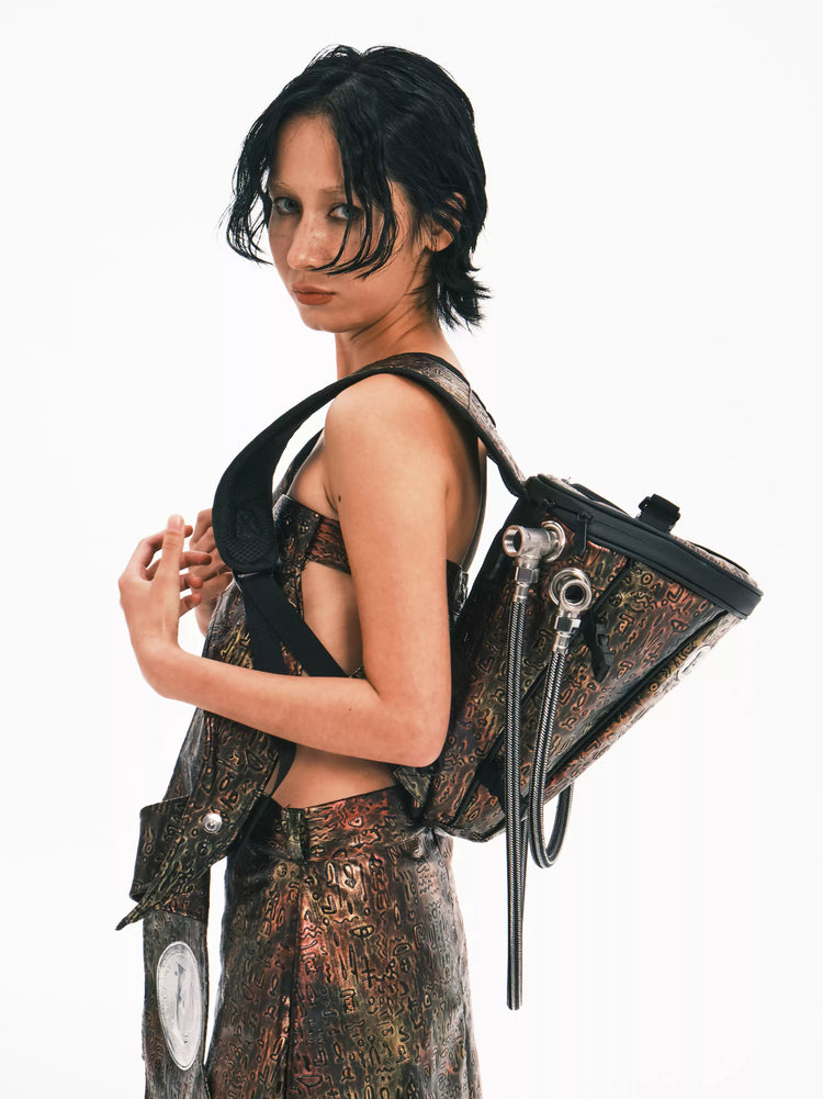 EMBRYO ORACLE embossed backpack — alternate styled presentation